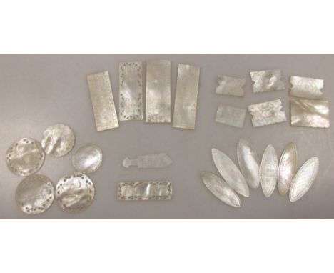 Approxiamately fifteen Chinese mother of pearl counters 