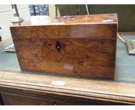 A Regency yew wood tea caddy 