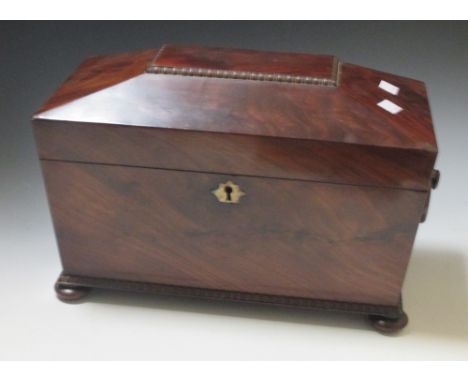 A Regency mahogany sarcophogus tea caddy 