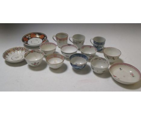 Eight New Hall tea bowls, to include one with the blue and white 'Trench and Mortar' pattern, three saucers and three cups (1