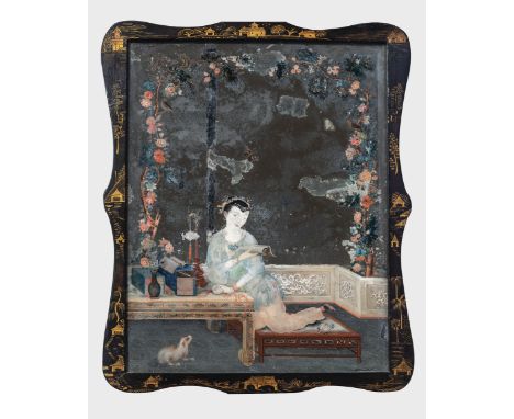 A pair of 18th century Chinese export reverse mirror paintings, the first with a reclining lady reading a scroll by a low tab