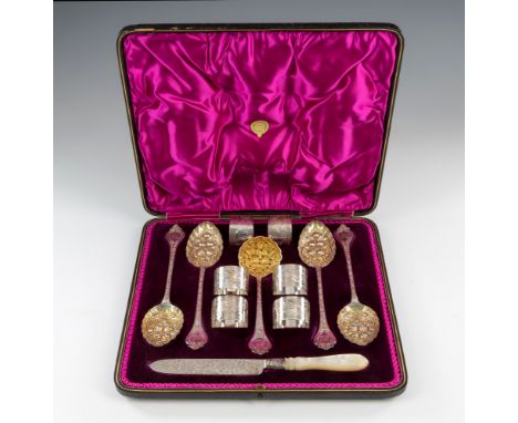 A fine Victorian cased silver dessert set, Josiah Williams & Co, London 1894-95, comprising a set of four berry spoons and a 