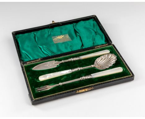 A cased Victorian silver condiment set, William Devenport, Birmingham 1899, comprising a spear headed butter spade, shell bac