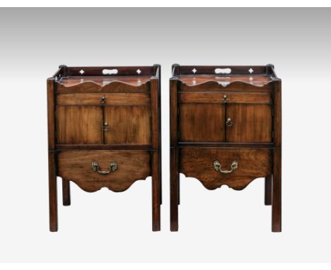 A good pair of George III mahogany bedside tray top commodes or night tables, each with pierced tray top and shallow drawer, 