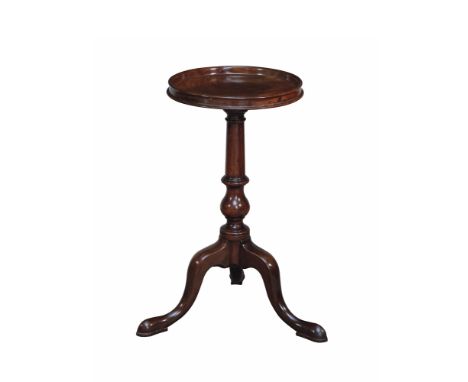 A George III mahogany wine table, with circular tray top, raised on a baluster turned column and tripod cabriole legs with pa