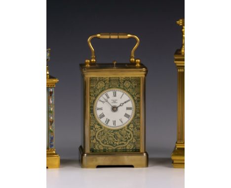 A Halcyon Days gilt brass and enamel repeating carriage clock, the white Roman enamel dial signed 'HALCYON DAYS ENAMELS', wit