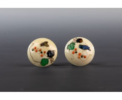 A pair of Japanese ivory and shibayama buttons, Meiji period (1868-1912), inlaid with semi-precious stones and coral, of leav