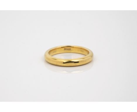 A 22ct yellow gold wedding band, ring size L.