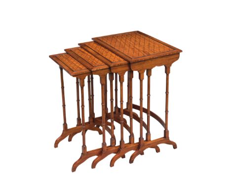 A set of four satinwood Sheraton style rectangular quartetto tables, late 19th century, each with inlaid trellis-pattern cent
