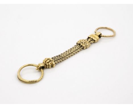 A Victorian 14ct yellow gold fob or pendant strap, the double curb link strap with foliate and rocaille decorated mounts, eac