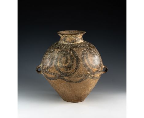 A Chinese Neolithic period twin handled terracotta jar, c. 2000-1500 BC, of tapered ovoid form, with twin loop handles to the