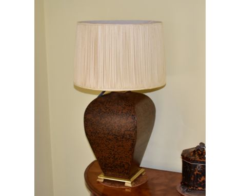 A pair of Oriental vase style lamps, the ceramic lamps of squared ovoid form, with crackled bronzed finish, on a laquered bra