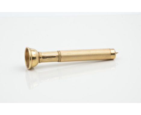 A 9ct gold cigar piercer, maker S. J. Rose & Son, hallmarked Birmingham 1989, the sprung pierced with slide-off cover, with e
