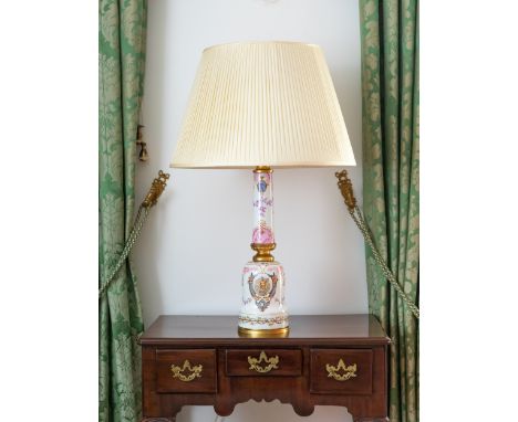 A matched pair of French porcelain and ormolu columnar lamps, third quarter 19th century, with tapering cylindrical upper sec