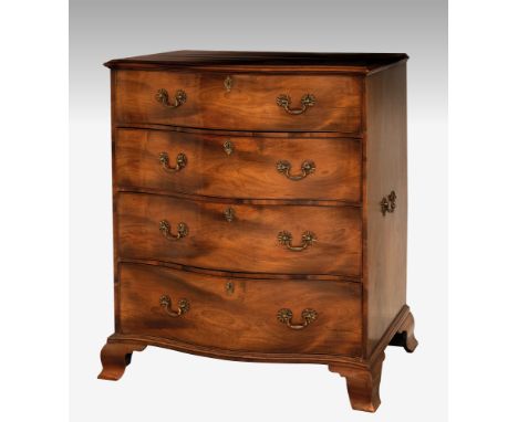 A George III mahogany serpentine fronted chest, in the manner of Gillows of Lancaster, unusually large, of four deep drawers 