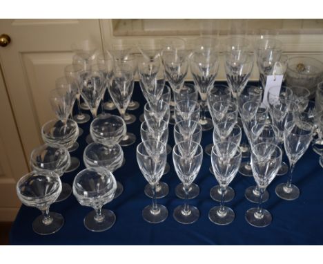 A suite of Dartington cut glass drinking glasses, the tulip bowls with basal petal cutting, comprising eight red wines, five 