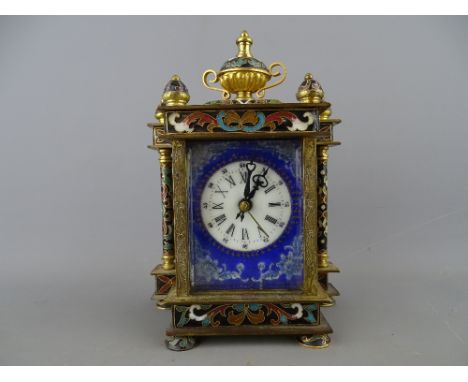 French gilt brass and champleve enamel mantel clock with enamel decorated dial and side panels showing images of young women,