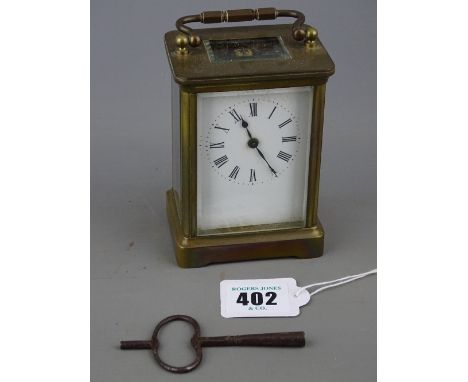French brass cased carriage clock with key