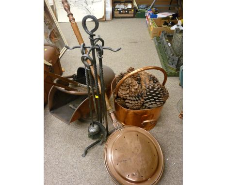Helmet shaped coal scuttle, a set of wrought iron fire irons, a pair of vintage bellows etc
