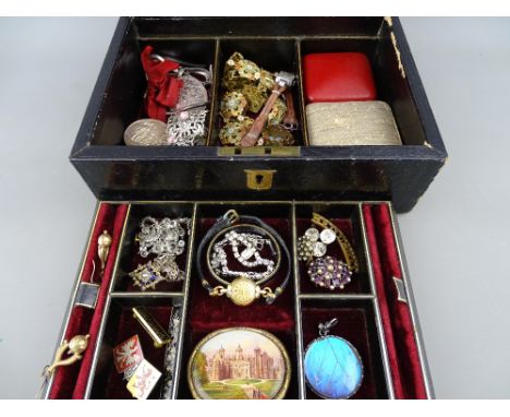 Vintage jewellery box and contents including an eighteen carat gold cased lady's watch, a silver and butterfly wing pendant, 