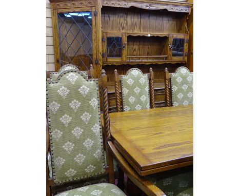 Well presented dining room suite of Jacobean style furniture by Jaycee comprising oak carved extending dining table with six 