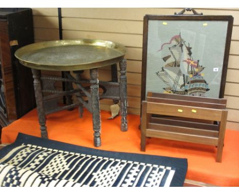 Large Eastern style Benares brass topped table, firescreen with frigate tapestry insert, small mid Century magazine rack and 