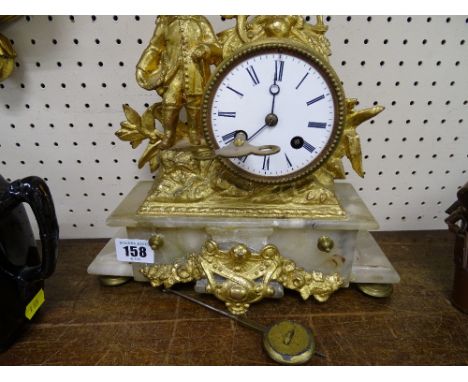 Ormolu and mineral based decorative mantel clock