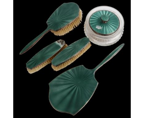 A George V Art Deco silver and green enamel 5-piece dressing table set, comprising hand mirror, 1 x hair brush, 2 x clothes b