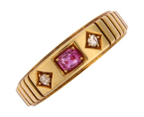 A Victorian 18ct gold three stone ruby and diamond ring, maker's marks WGM, Birmingham 1881, setting height 5mm, size K, 3.2g