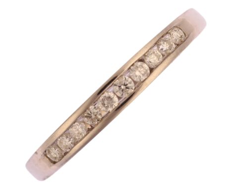 A modern 18ct white gold diamond half eternity ring, channel set with modern round brilliant-cut diamonds, total diamond cont