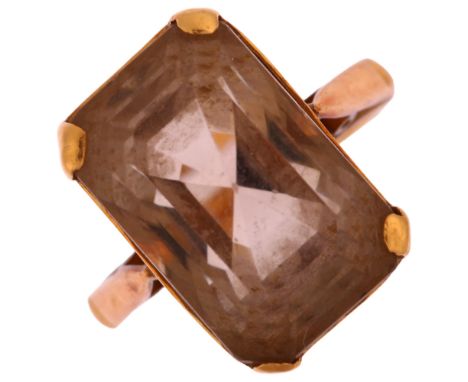 A late 20th century smoky quartz dress ring, unmarked gold settings with rectangular step-cut quartz, setting height 16.1mm, 