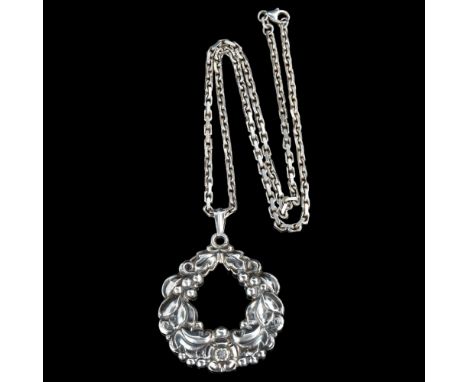 CARL M COHR - an Art Nouveau Danish silver laurel wreath pendant necklace, on later sterling cable link chain, pendant height