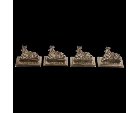 A cased set of 4 George V novelty silver Louis Wain cat menu card holders, by Levi & Salaman, hallmarks Birmingham 1910, each