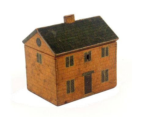 An early Tunbridge ware white wood paint decorated cottage sewing box, the pitched tile roof with chimney, the sides in brick