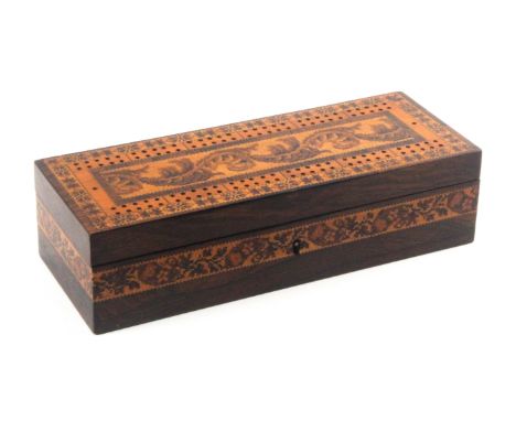 A Tunbridge ware rosewood cribbage box, of rectangular form, the lid with a fine central mosaic panel of leaf scrolls within 