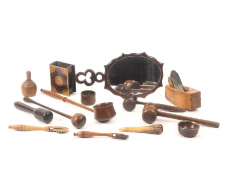 Treen - fourteen items, comprising a 19th Century ladle, handle loose in aperture, 27cms, a hardwood priest, 14.5cms, a drum 