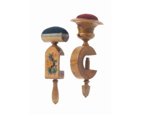 Two wooden sewing clamps, comprising a boxwood example, the 'C' frame below a vase form pin cushion unscrewing to reveal a mi