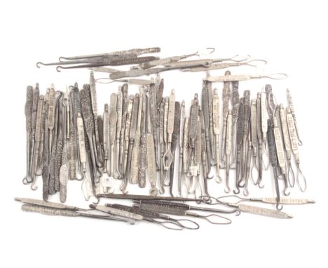 A collection of circa 75 steel button hooks, with tablet form handles mostly featuring adverts, circa 1900. (75) From the col