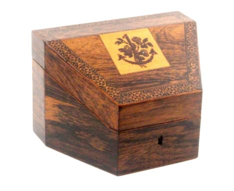 A Tunbridge ware rosewood stationery box, of trapezoid form, the slanting lid inset with a mosaic of an anchor and flowers wi