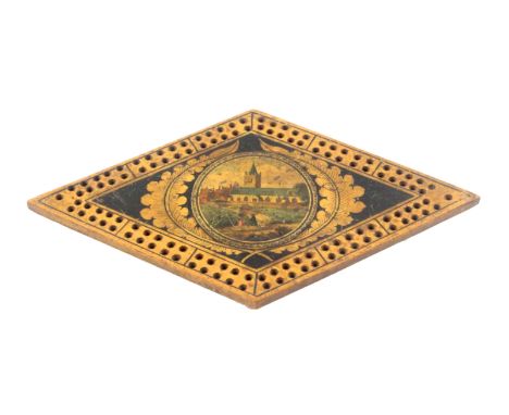 An early Tunbridge ware white wood print and ink decorated diamond form cribbage board, with central print of a church, possi