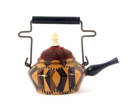 A Tunbridge ware tea pot pin cushion by Thomas Barton, stick ware body, rosewood spout, brass wire handle with insulator, cir