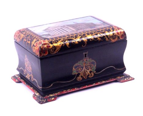 A papier mache tea caddy, circa 1840, of rectangular form, the cushion lid with inset reverse decorated glass panel titled 'R