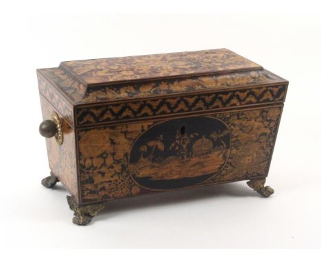 A fine pen work tea caddy, possibly relating to the Tunbridge trade, of sarcophagol form, the front with an oval eastern styl