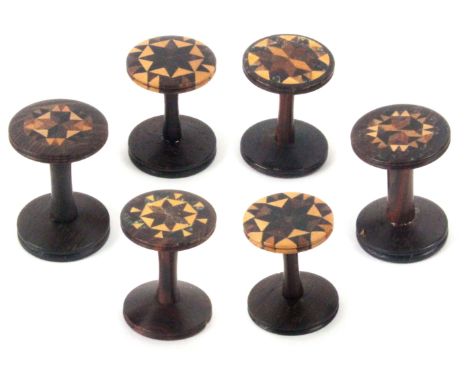 Six Tunbridge ware reels, each in rosewood with stick ware top including a pair, each approximately 3.5cms high. (6) From the