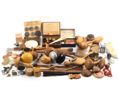 A collection of darners and bygones, comprising various wooden and other darners, a boxed game of 'Merelles', labelled for 'D