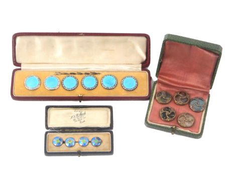 Buttons - three cased sets, comprising a set of six blue enamel with scroll borders, one lacking shank, 2.3cms, in leatherett