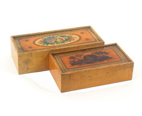 Two early Tunbridge ware white wood paint decorated rectangular boxes, both with plain sides and sliding lids, the larger pai