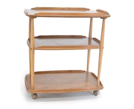 Ercol elm and beech three tier trolley, on castors, 77cm (30in) high, 72cm (28in) wide, 45cm (17.5in) deep.