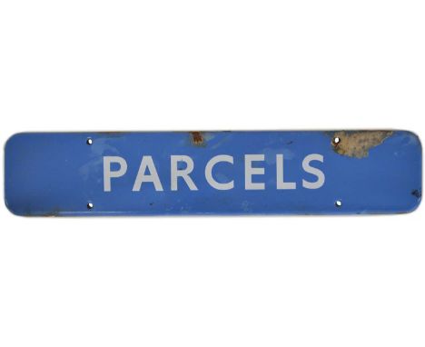 BR(SC) light blue enamel doorplate sign 'PARCELS'. 46cm (18in) wide, 9.2cm (3.5in) high.Qty: 1