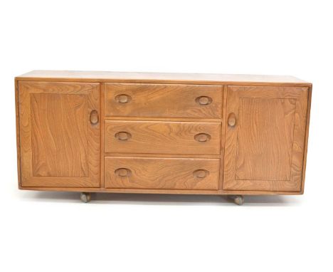 Ercol elm sideboard, having central drawer section flanked by cupboards, 155.5cm (61in) wide, 45cm (17.5in) deep, 68cm (27in)